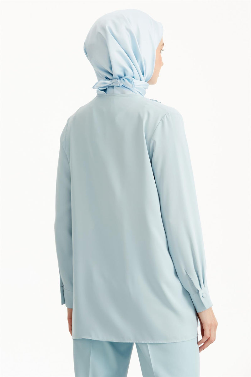 Chemisier à volants avec détails plissés