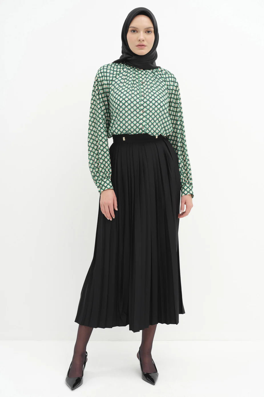 Jupe plissée avec accessoires en métal