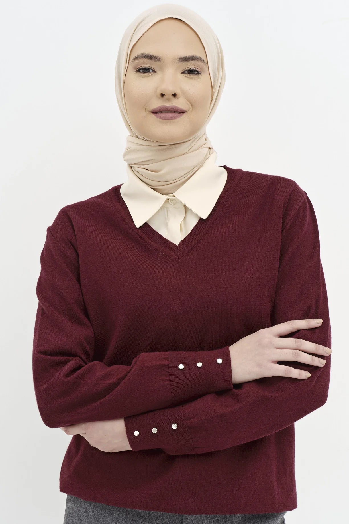 Pull détaillé avec boutons et manches