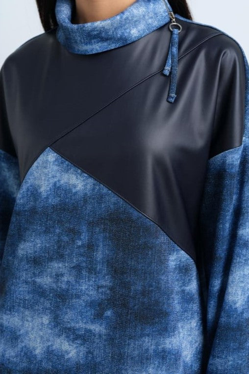 Tunique avec détaillée en cuir et fermeture