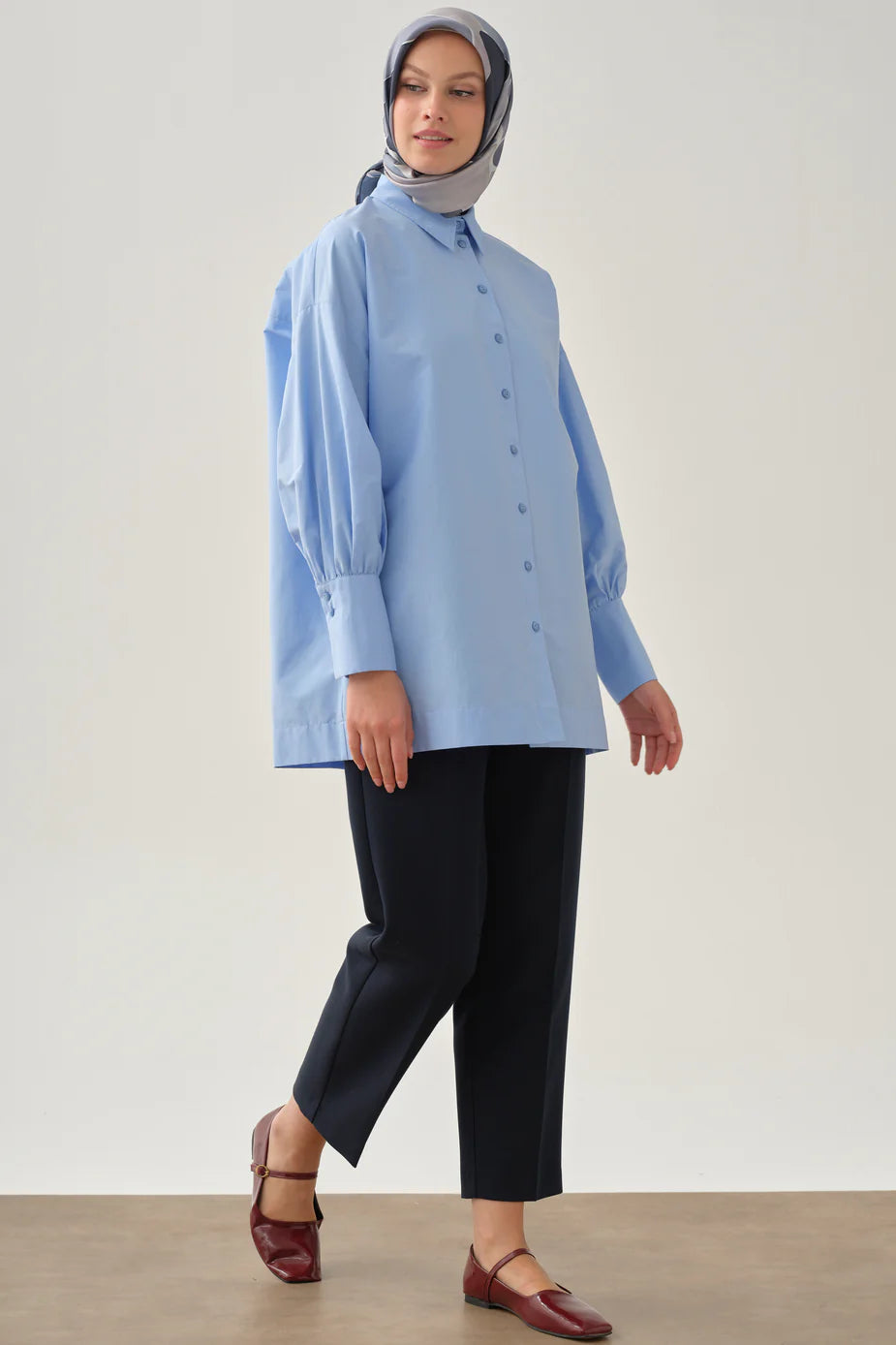Pantalon à pinces et poches