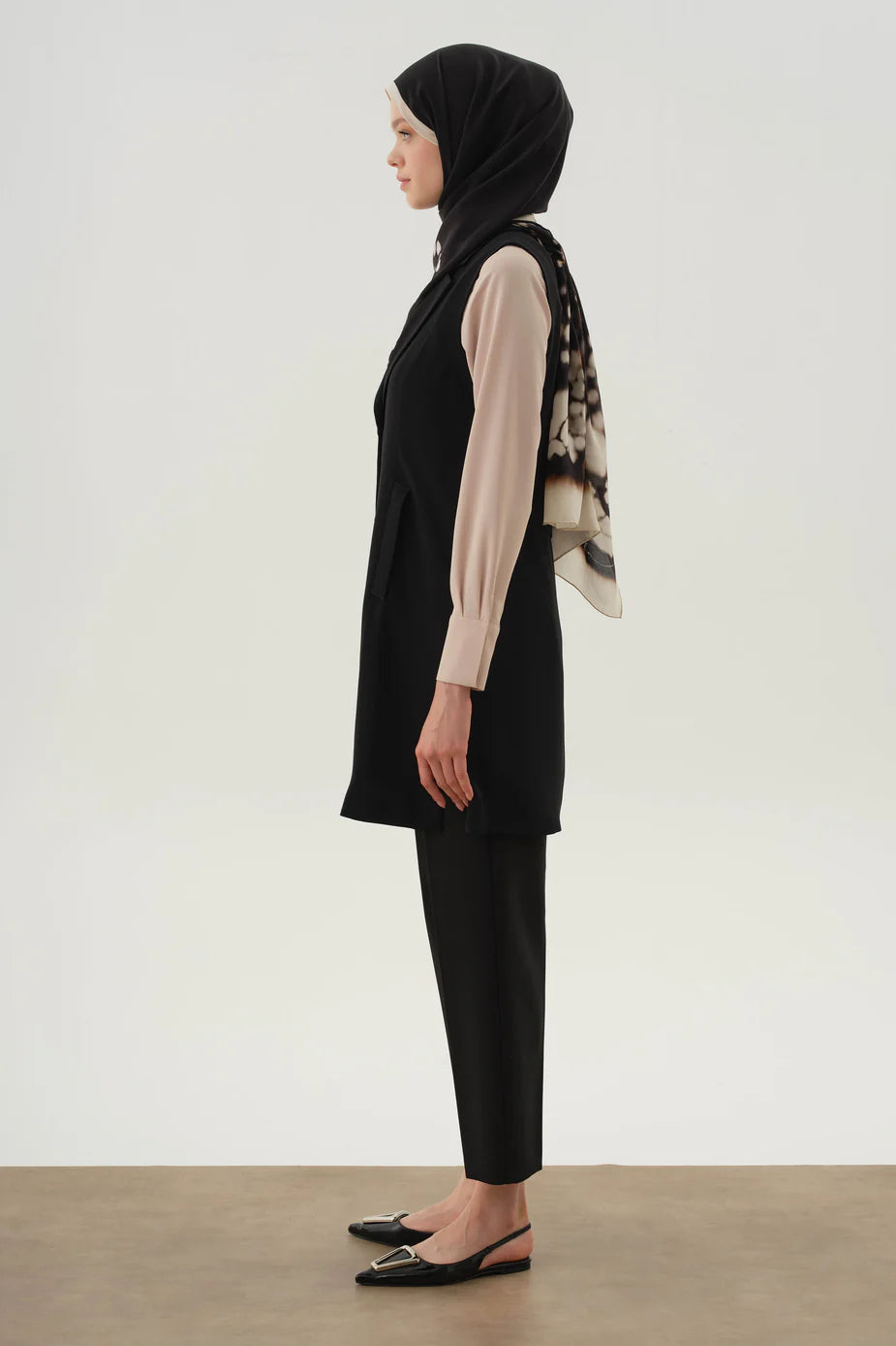 Pantalon à pinces et poches
