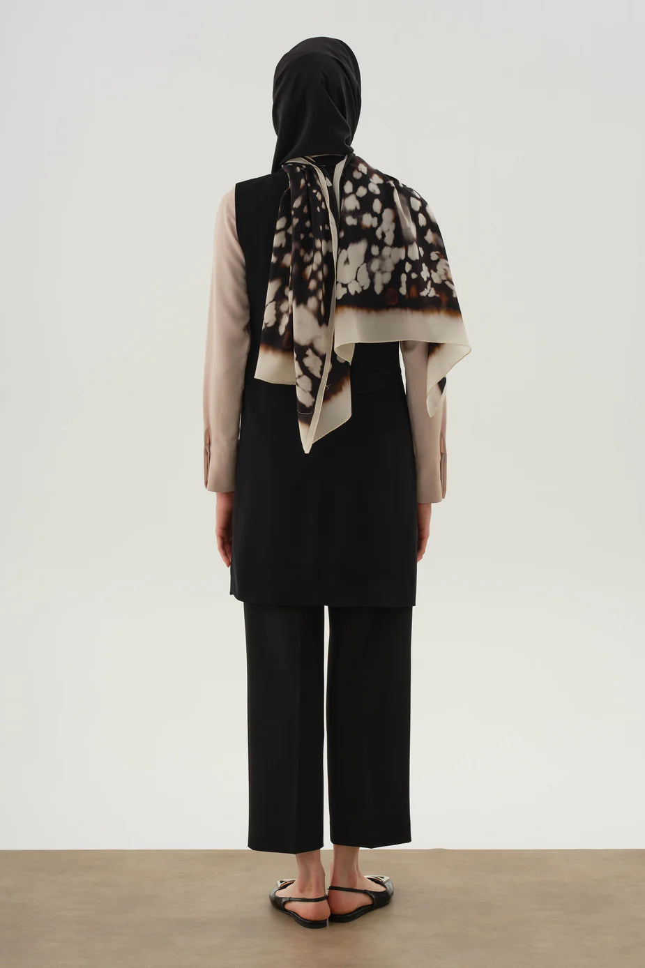 Pantalon à pinces et poches