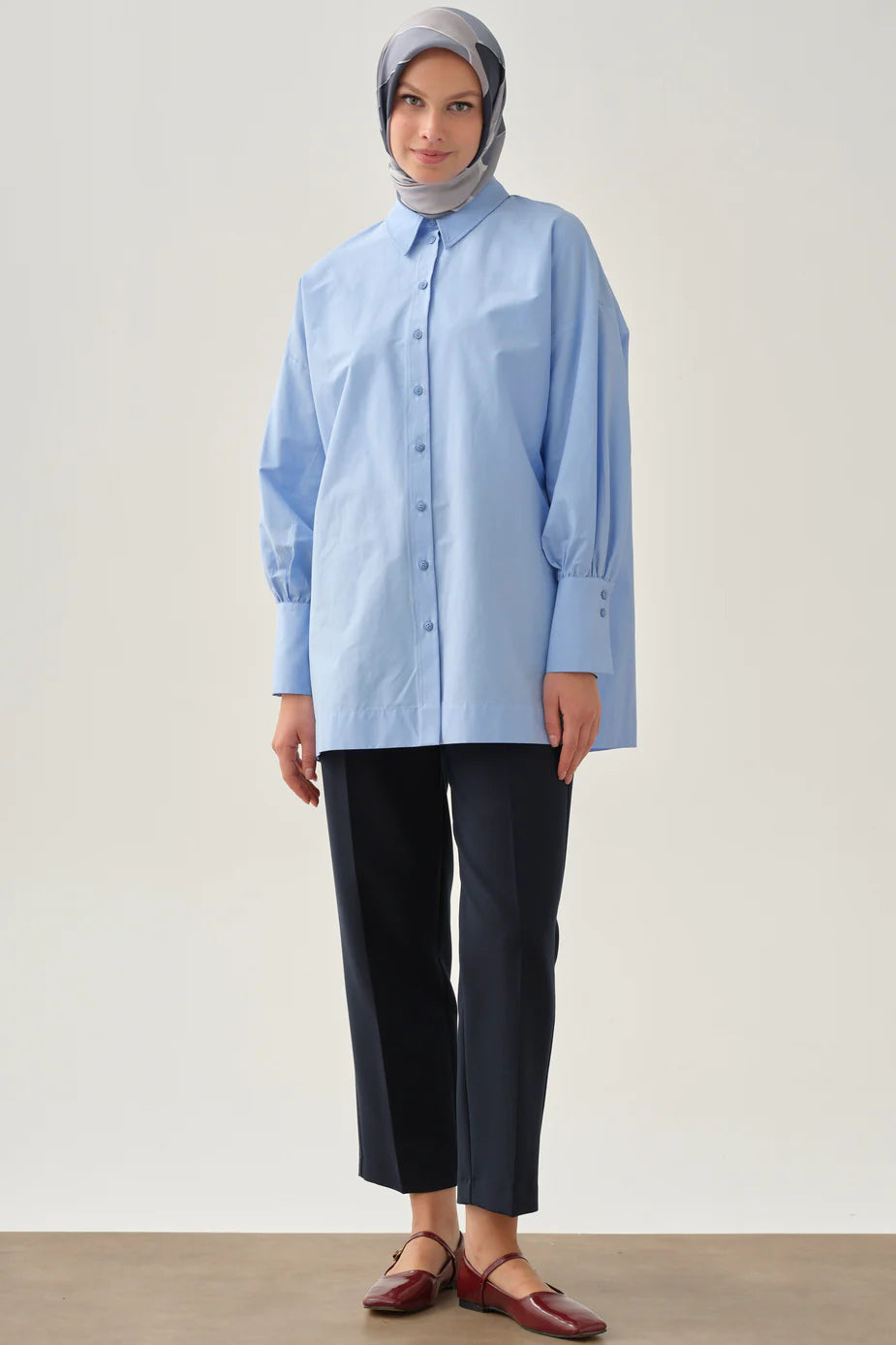 Pantalon à pinces et poches