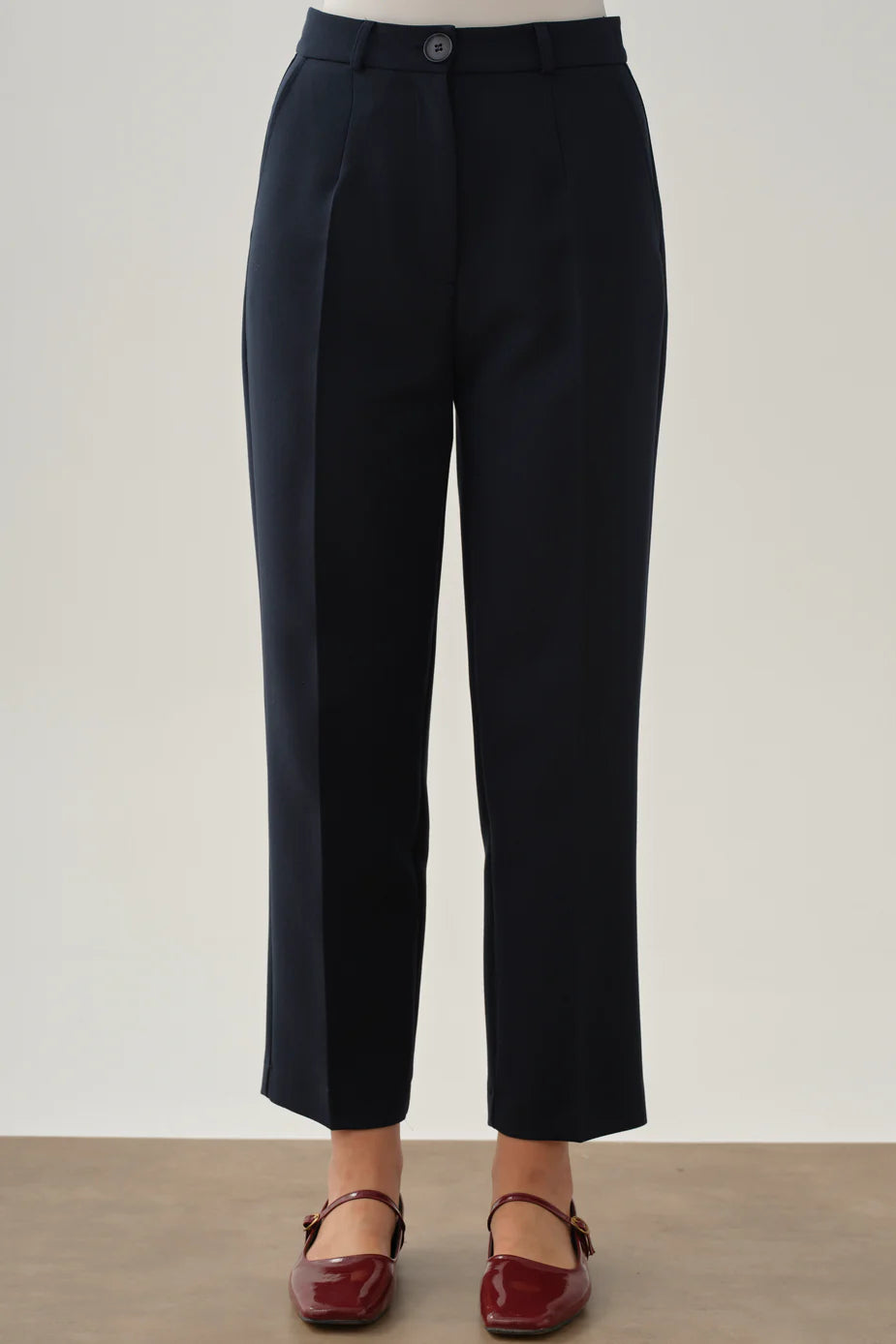 Pantalon à pinces et poches