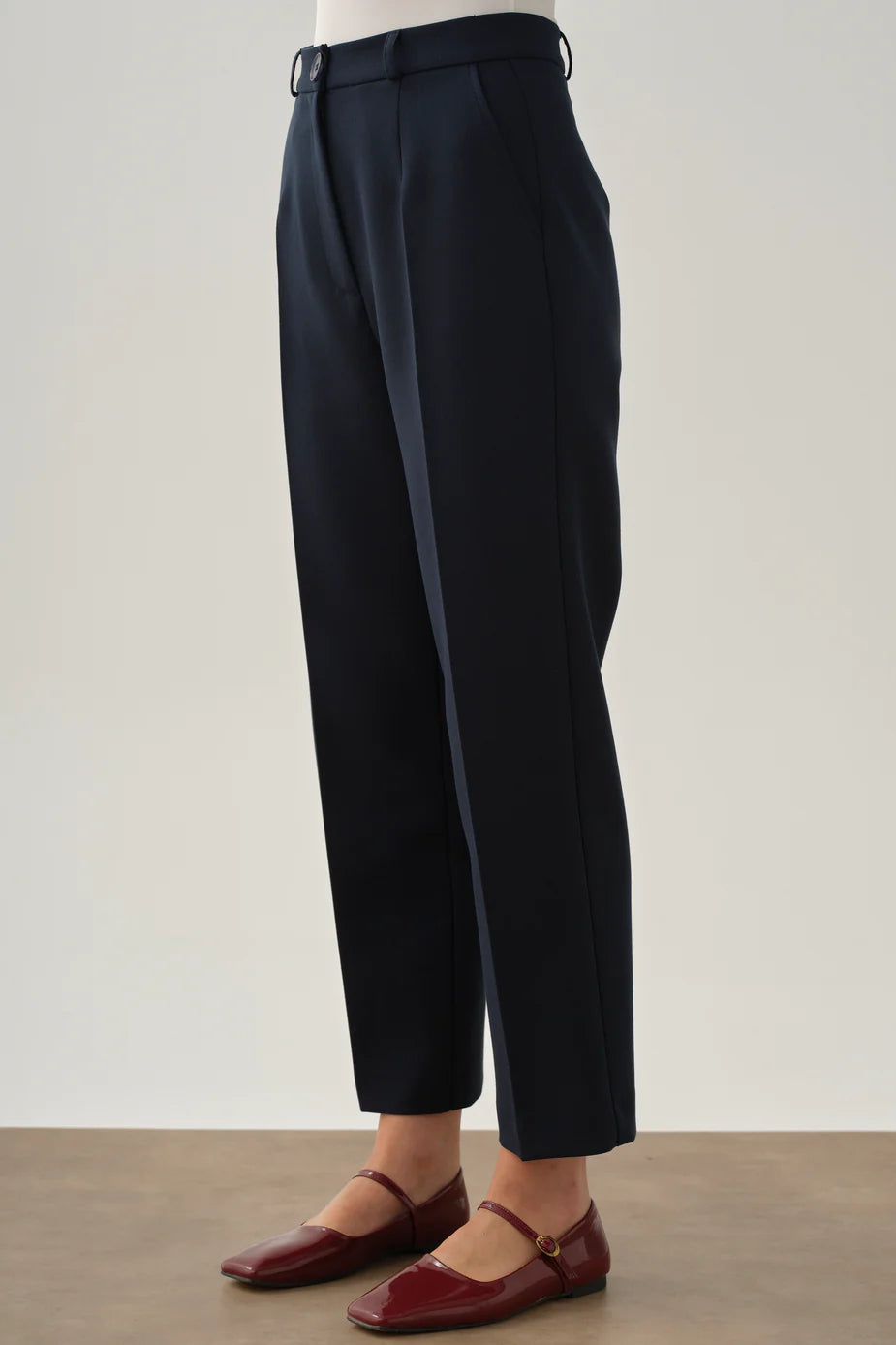 Pantalon à pinces et poches