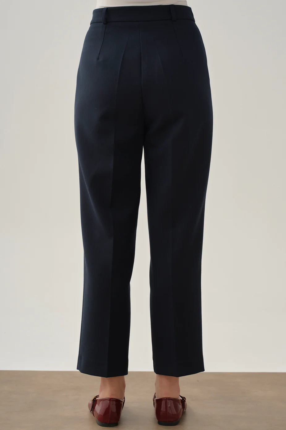 Pantalon à pinces et poches
