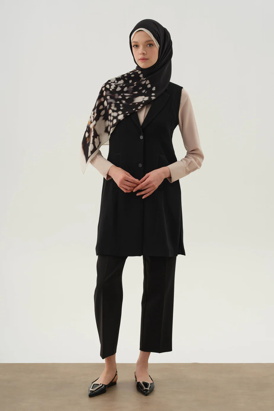 Pantalon à pinces et poches