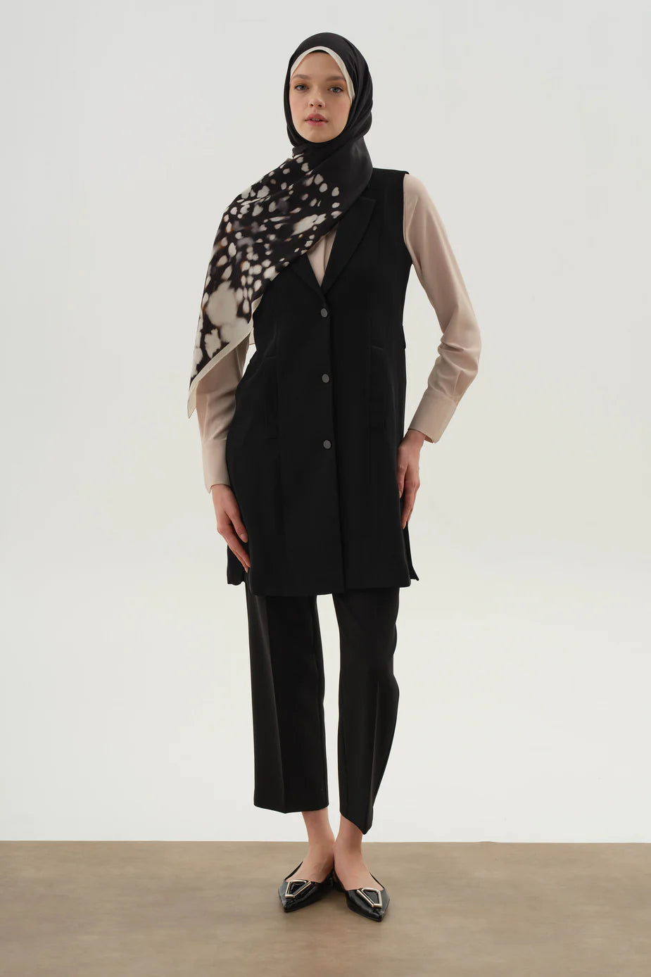 Pantalon à pinces et poches