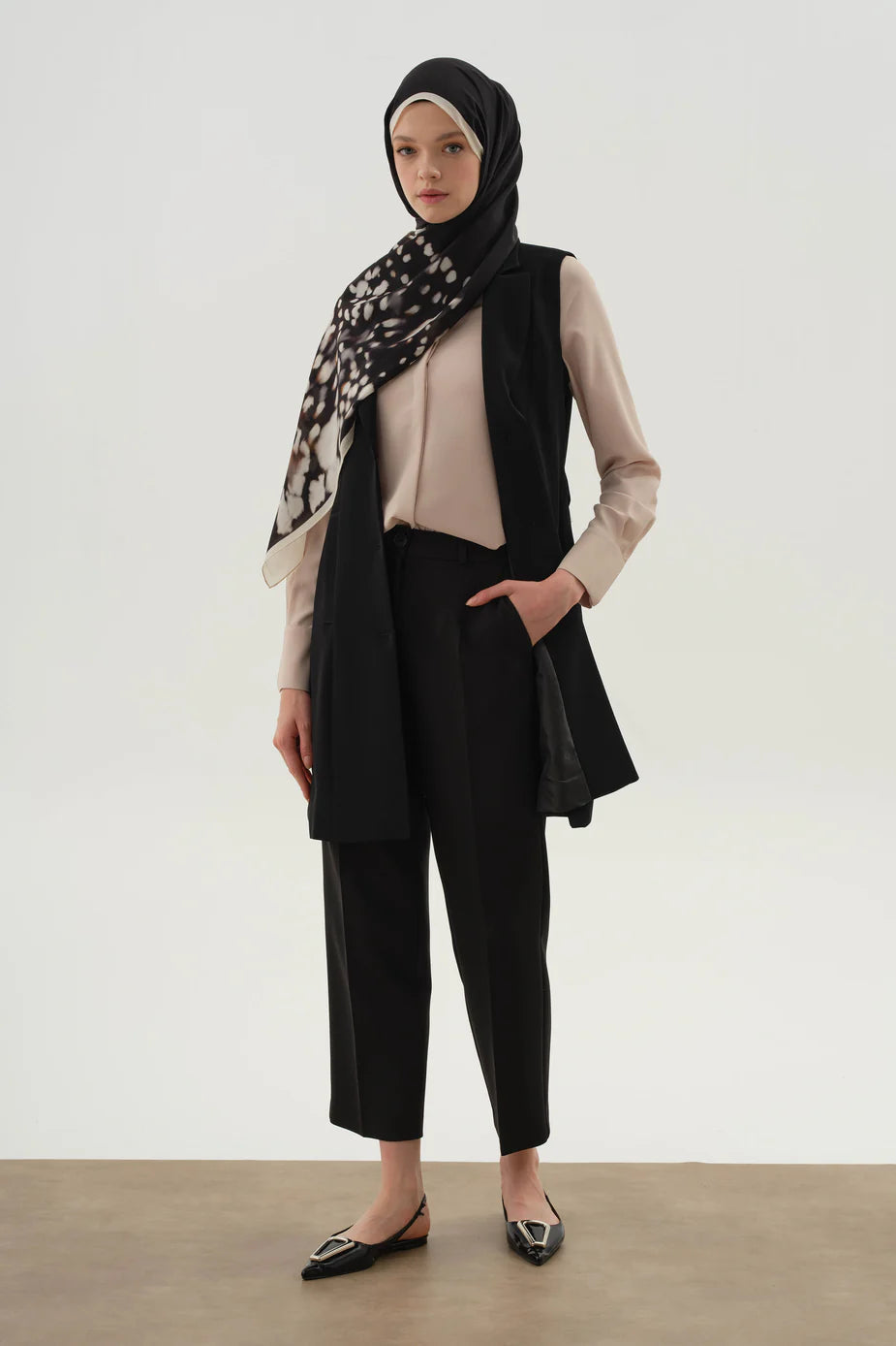 Pantalon à pinces et poches