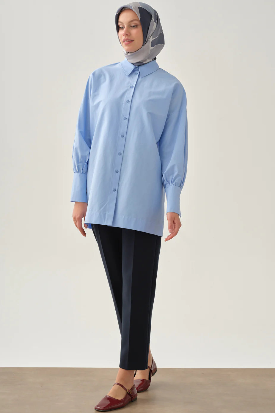 Pantalon à pinces et poches