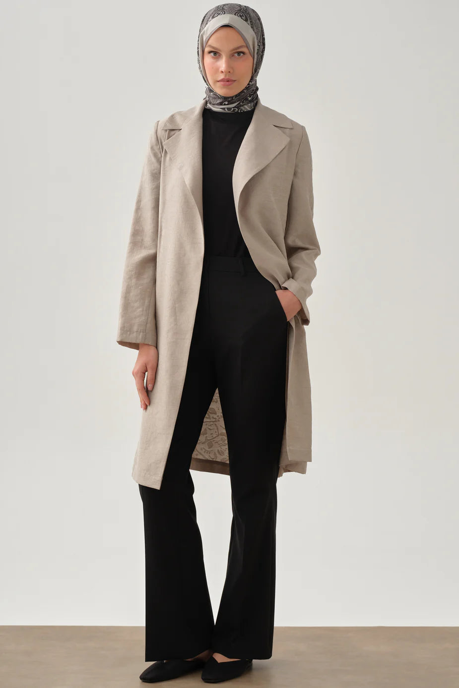 Pantalon à pinces et poches