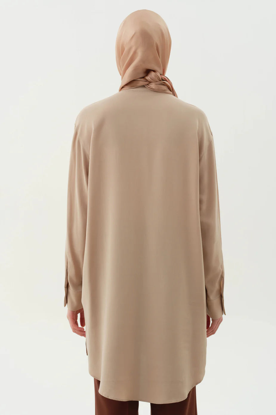 Tunique asymétrique à demi-patte