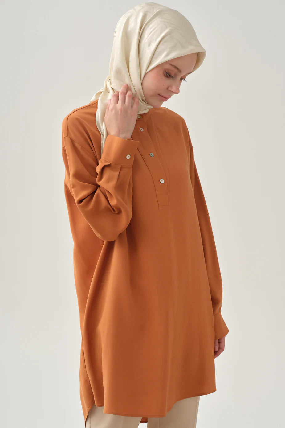 Tunique asymétrique à demi-patte