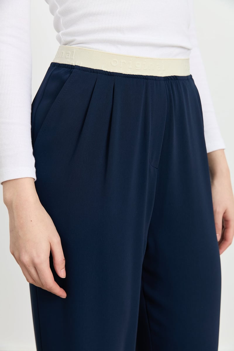 Pantalon plissé avec taille élastique