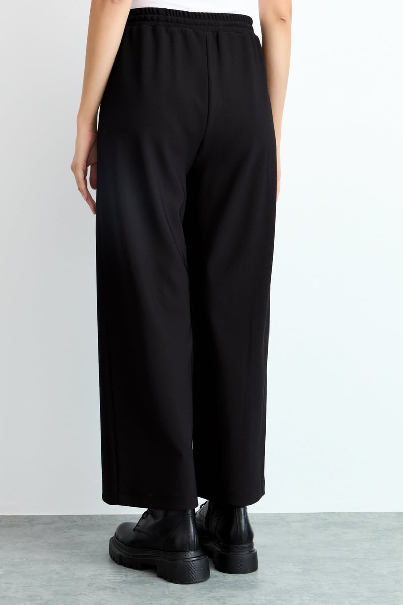 Pantalon large avec taille élastiqué