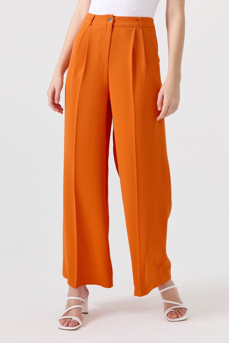 Pantalon large avec bouton