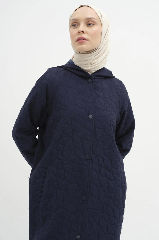 Manteau matelassée à capuche avec fermeture