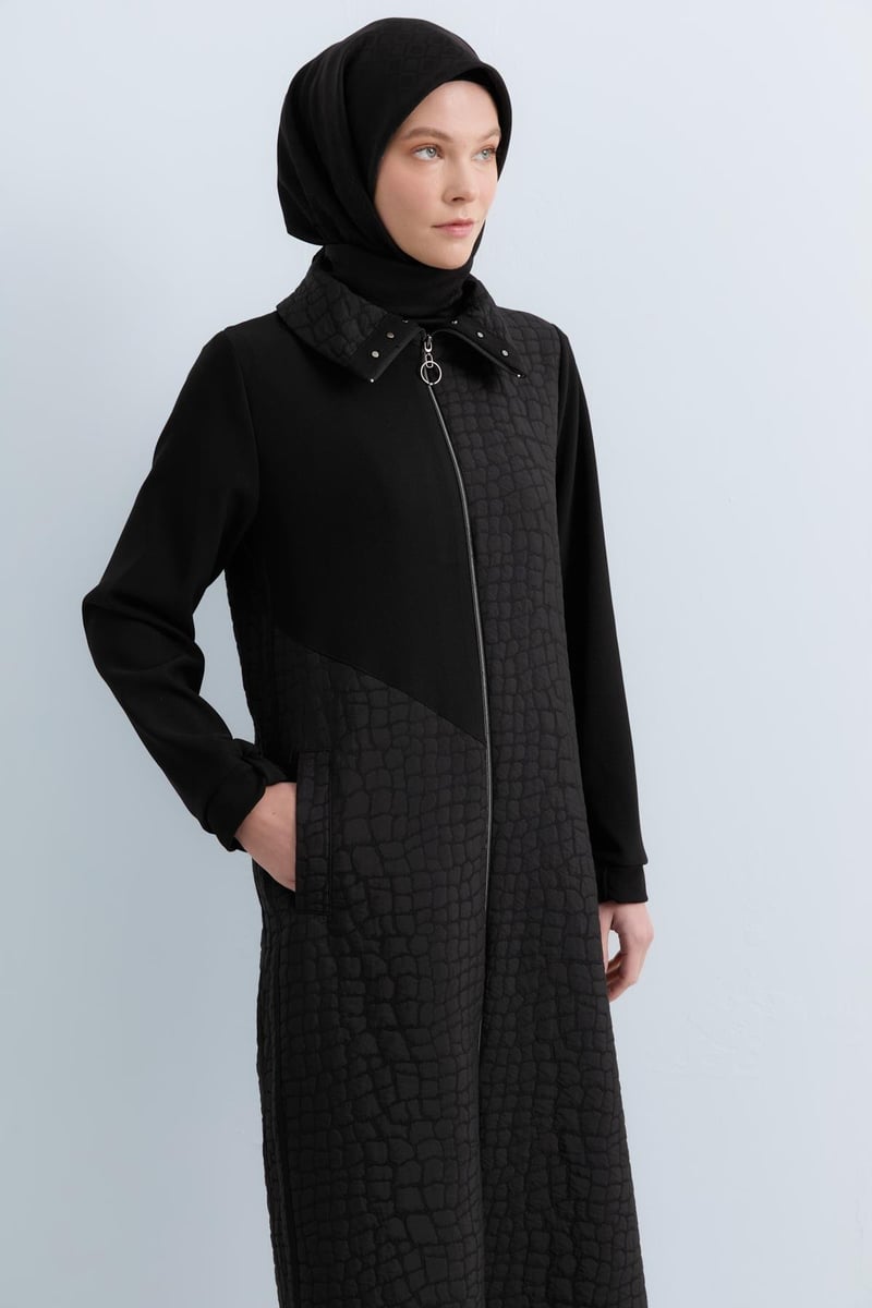 Manteau tricoté matelassé