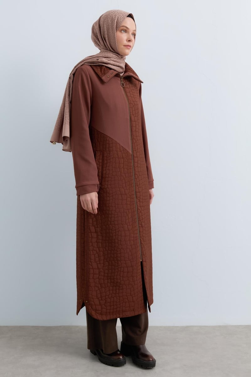 Manteau tricoté matelassé