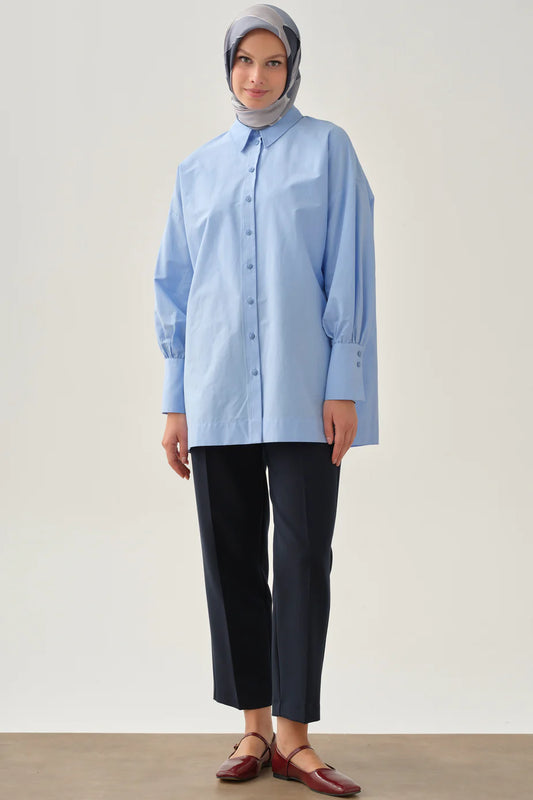 Pantalon à pinces et poches